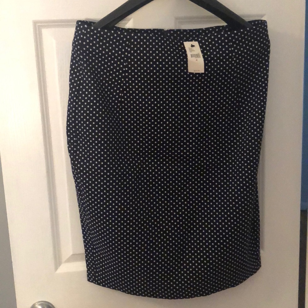 Polka dot skirt.